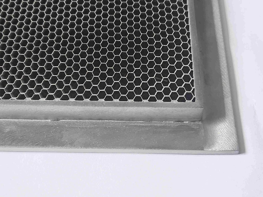 Honeycomb vent for EMI shielding and airflow in electronic enclosures