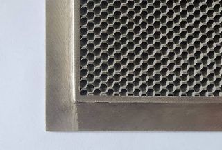 Honeycomb vent for EMC shielding and airflow control